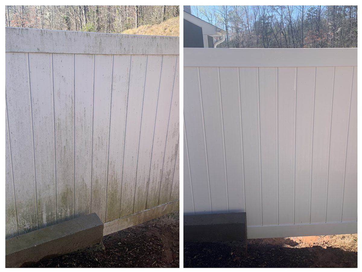 Before and after: green algae soft washed off a white vinyl fence